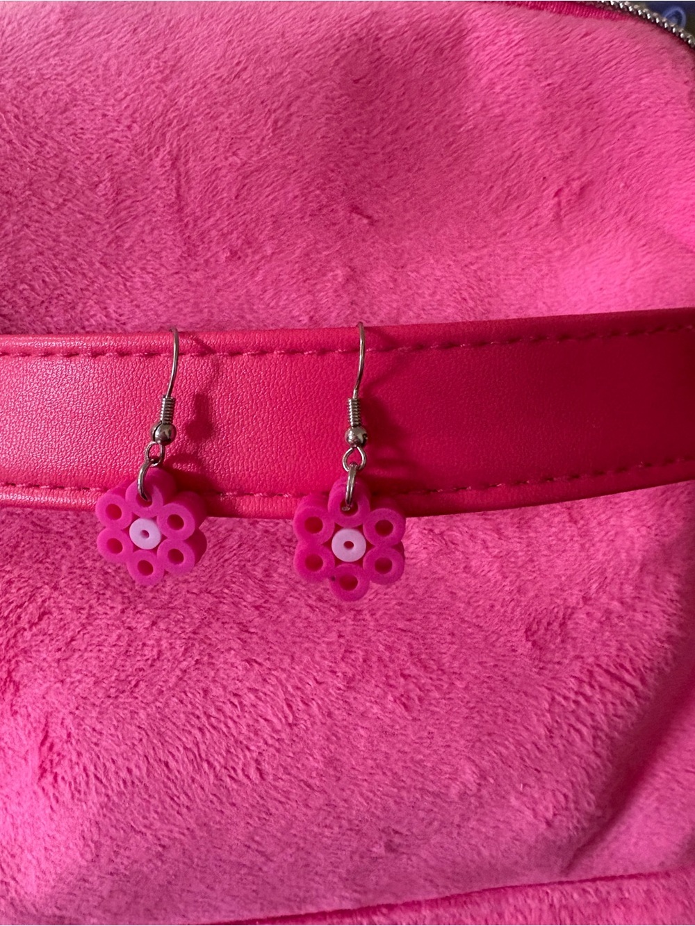 hand made pink with a light pink in the center flower earrings